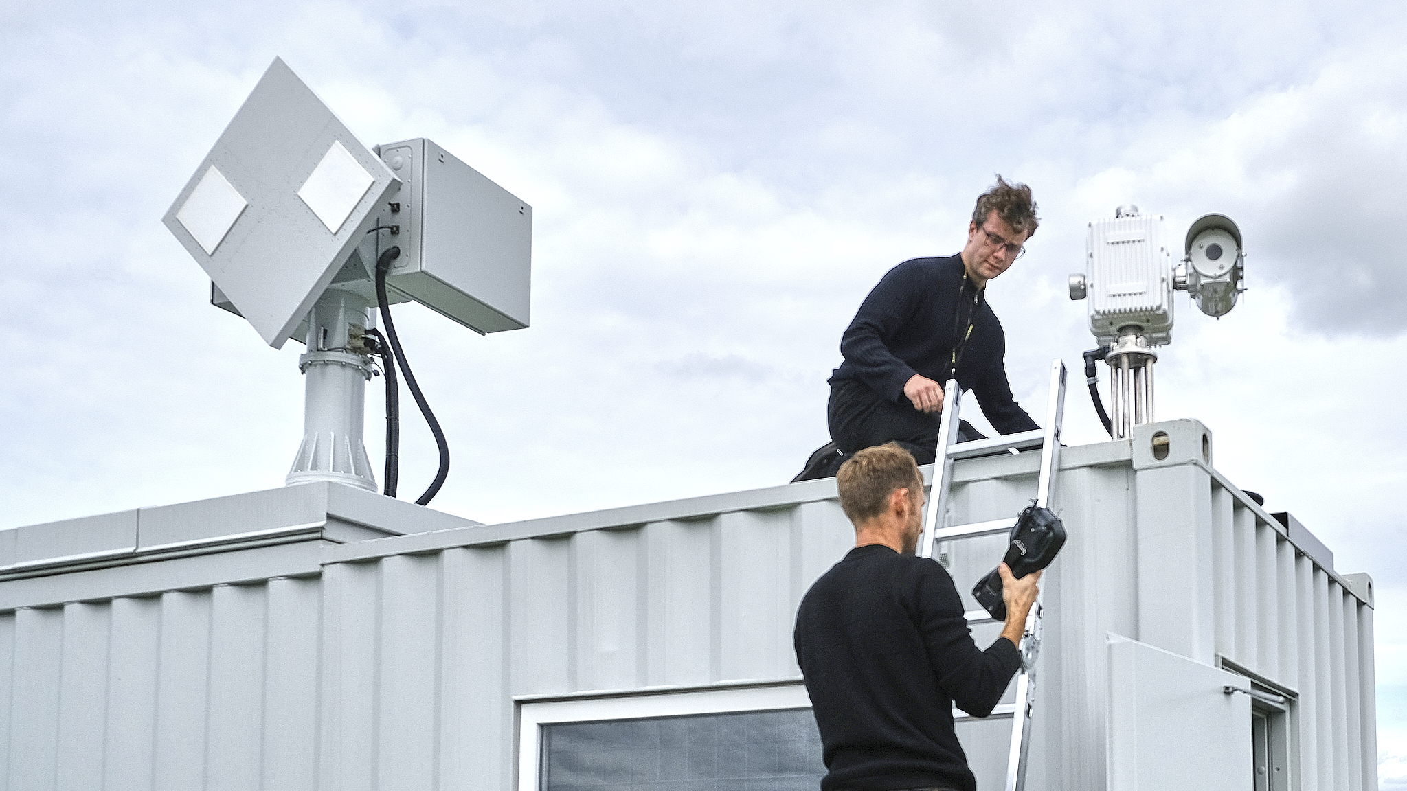 Also here, NRS staff doing maintenance on a NRS radar container